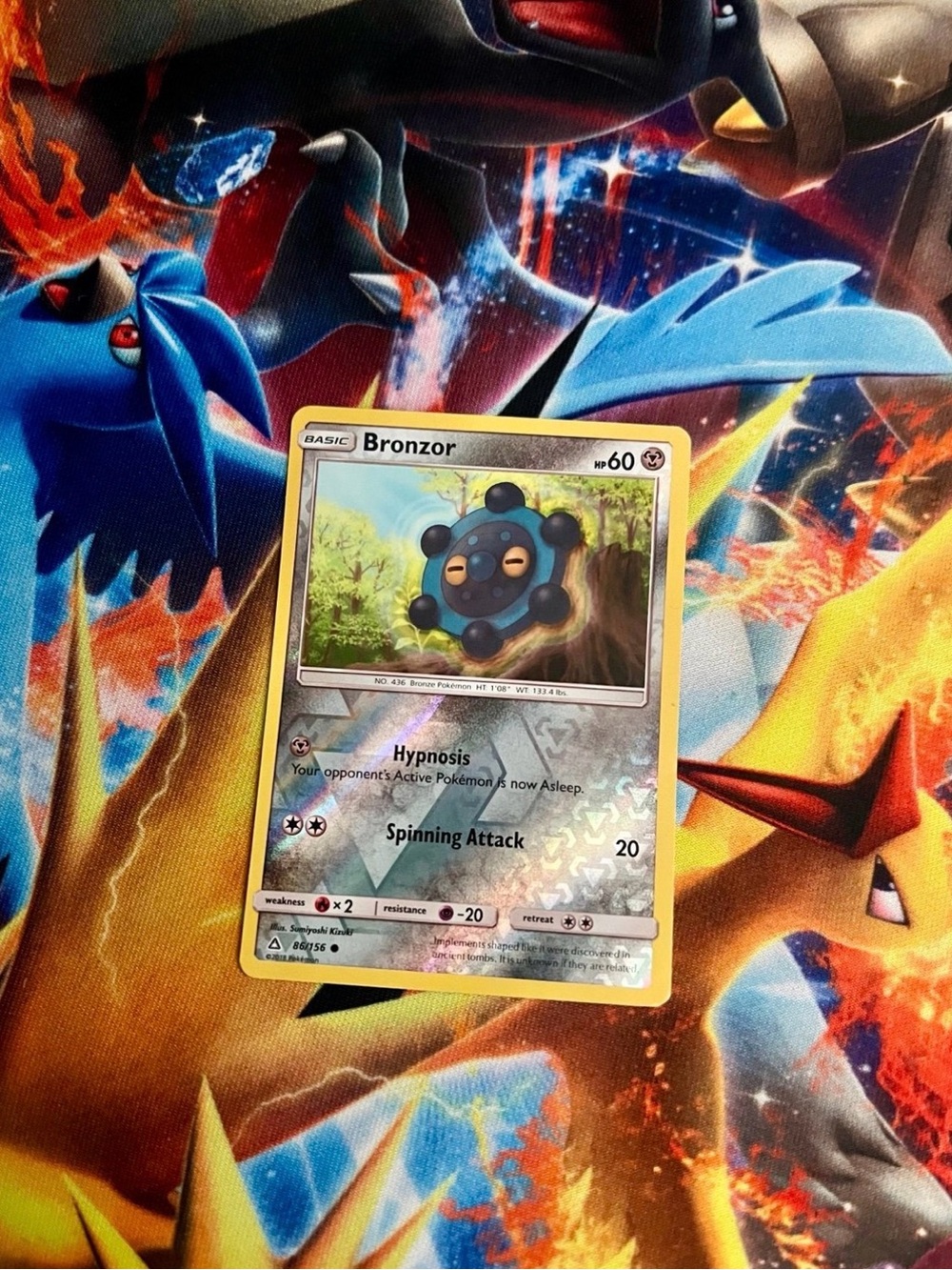 Pokémon Bronzor ultra prism revere holo card 2018